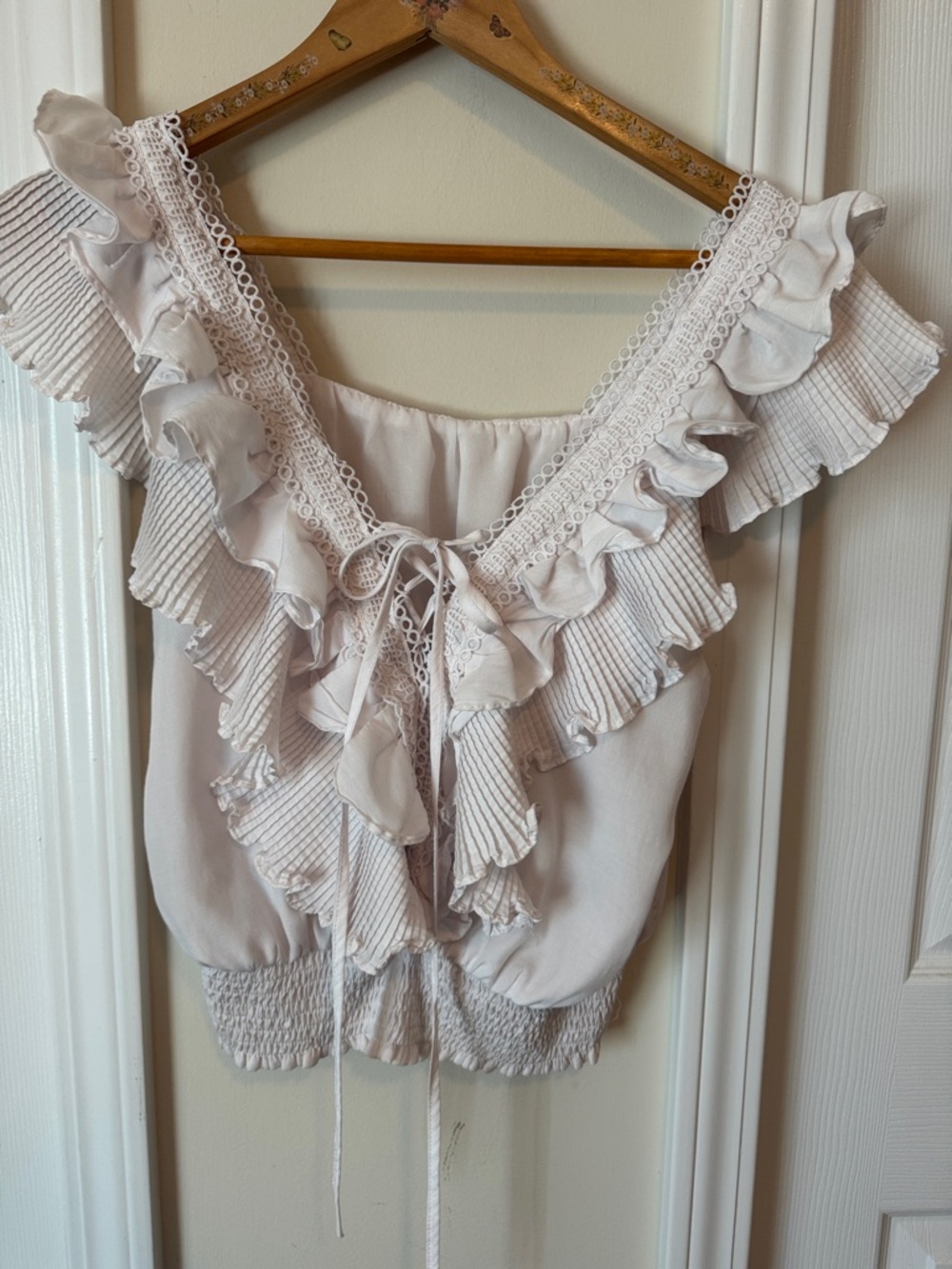 Ruffled V-Neck Sleeveless Blouse in Light Pink